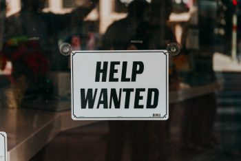 A 'help wanted' sign.
