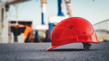 A hard hat on the ground.