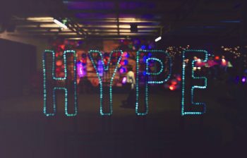 A sign lit up to spell 'hype'